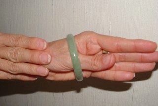 put on small jade bangle